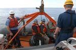 Transferring crew from another research vessel to the Carolyn Chouest