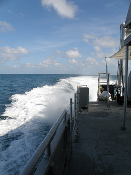 Looking down the starboard side of R/V MANTA toward the stern to see the wake behind the boat underway.