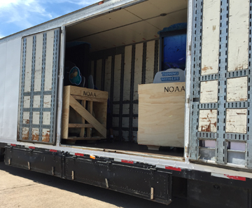 Exhibit crates loaded inside a semi truck