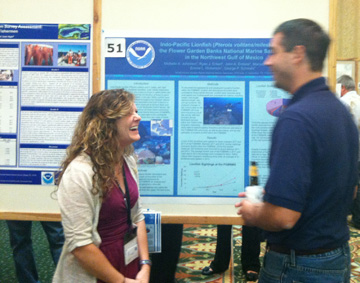 Michelle presenting a lionfish poster