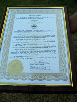 A framed proclamation from the City of Galveston.