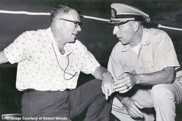 Tom Pulley talking to a Navy officer