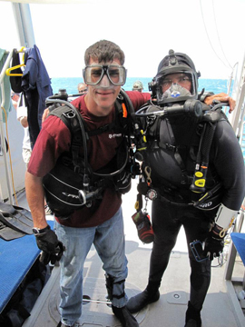 Two divers geared up and ready to go.