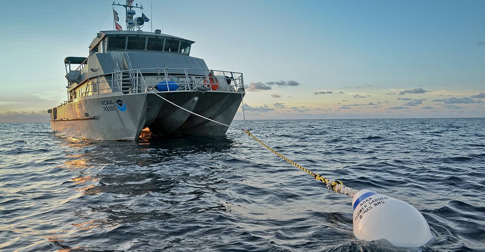 R/V MANTA tied up to a buoy in the sanctuary